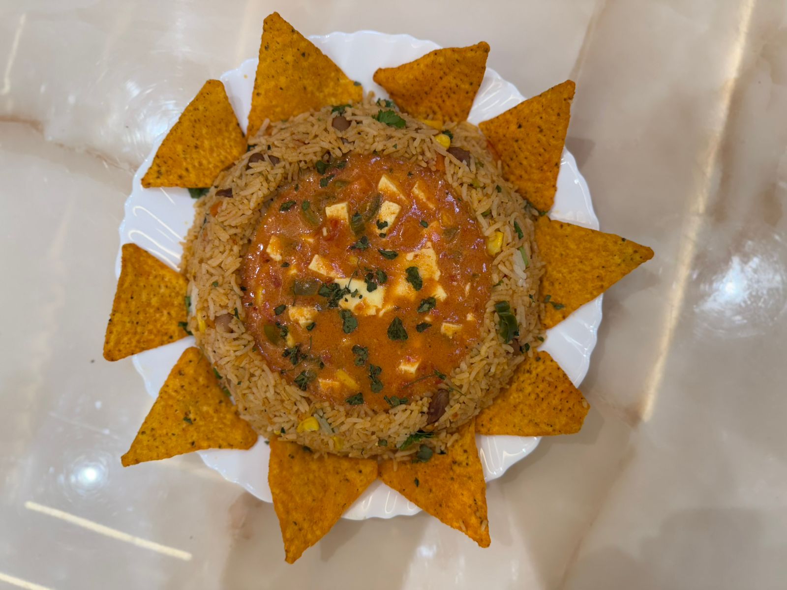 Rice & Paneer Curry with Nachos