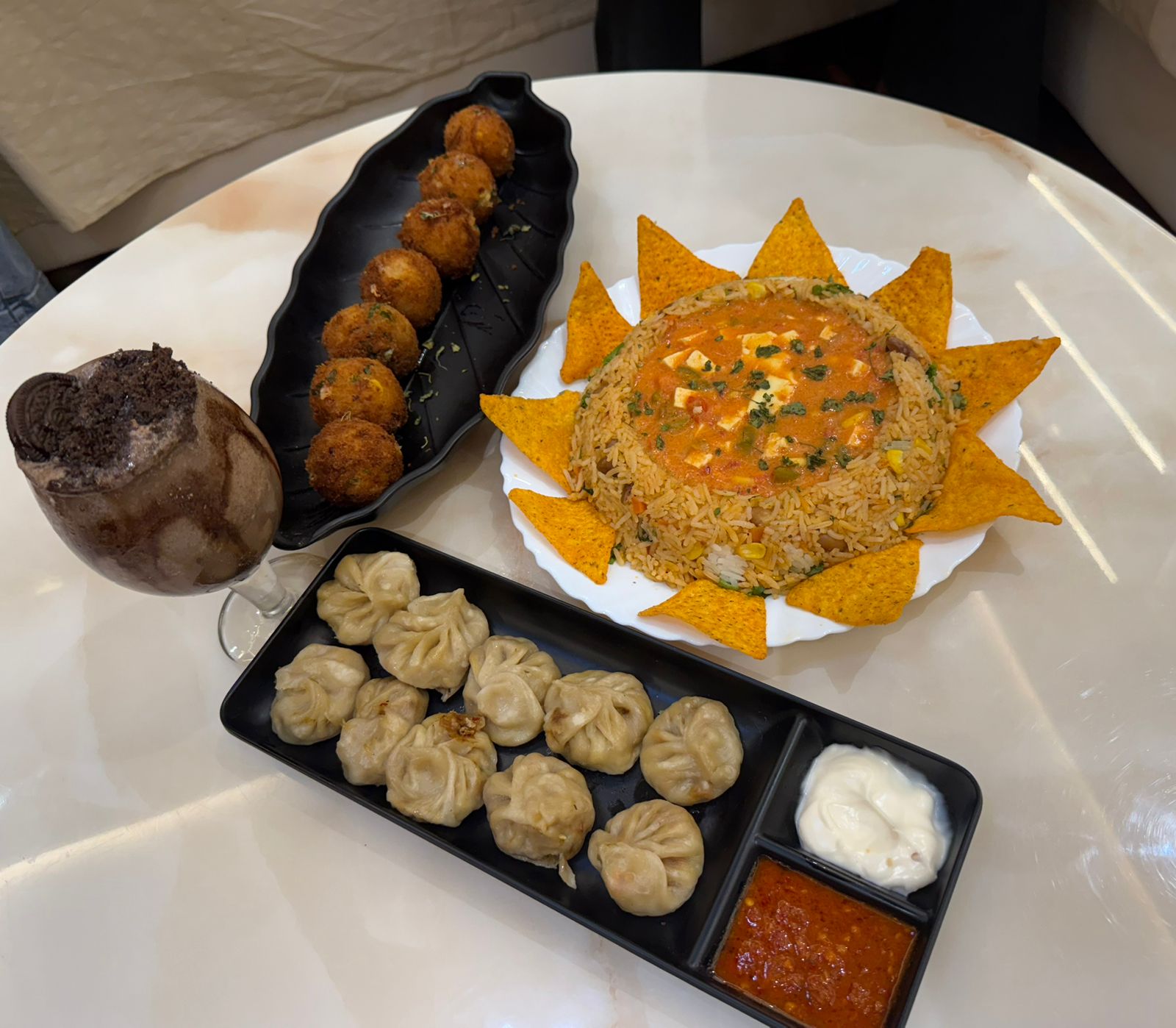 Meal spread - snacks and curries
